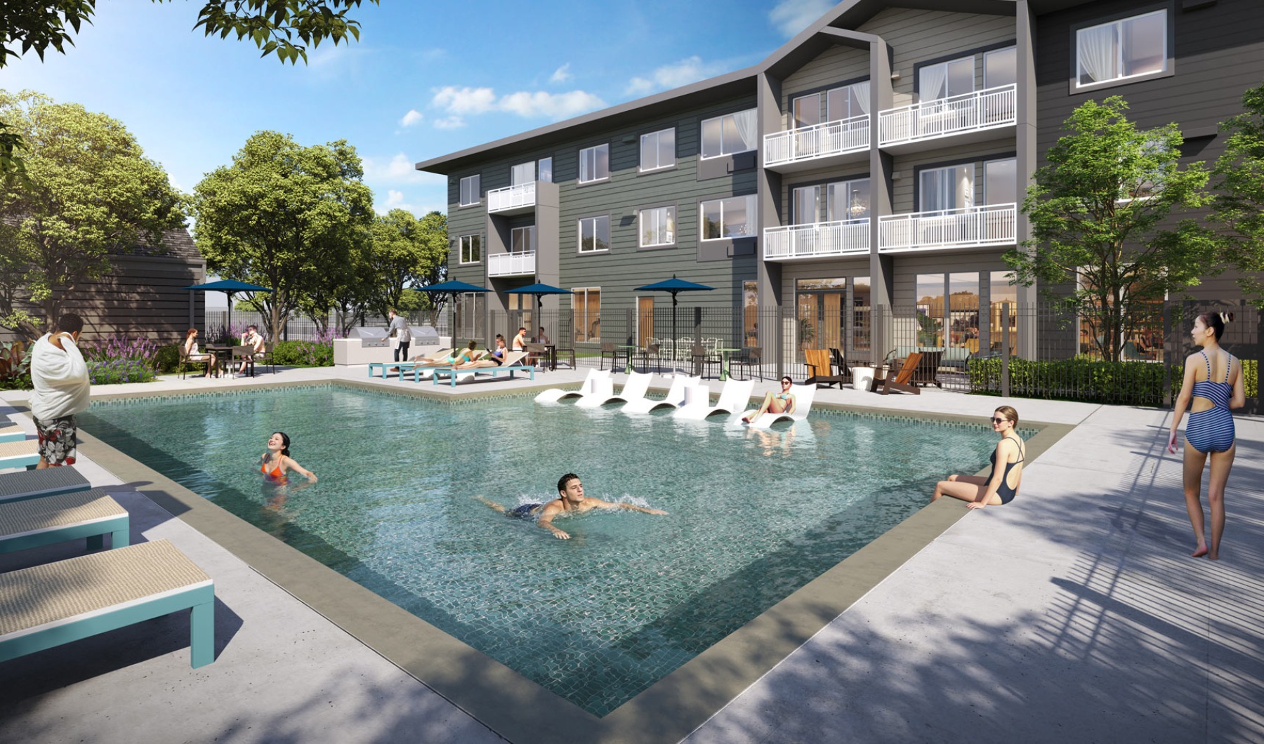 a swimming pool with a building and trees in the back